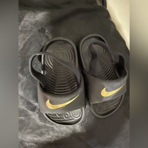Nike baby sandals Size 5 Color black with gold Brand new with box